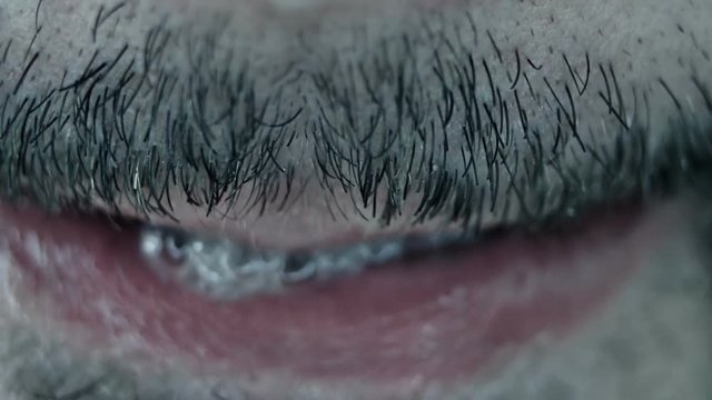 Man mouth macro - spit
