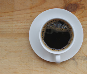 Cup of coffee over the top view