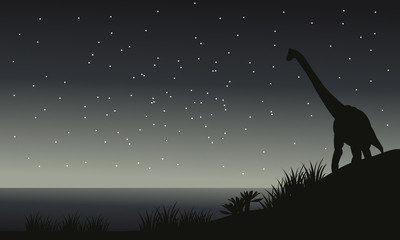 Silhouette of brachiosaurus at night © wongsalam77