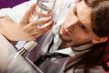 Closeup of barman at work.