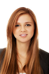 Naklejka premium Pretty teenager girl smiling in cheerful mood
