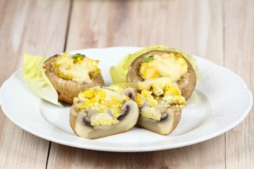 Grilled mushrooms with eggs, cheese