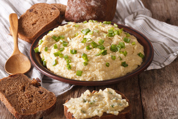 Jewish forshmak with rye bread close-up. Horizontal
