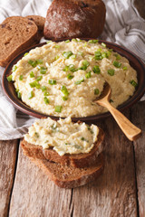 Homemade forshmak and rye bread close-up. vertical
