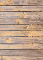 old planked wooden background with peeling paint residues