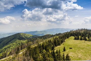 Clouds over the clearing in the mountains.