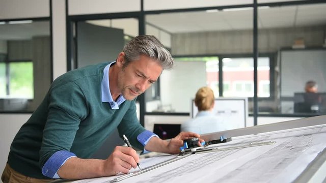 Architect working on project in office
