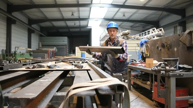 Man working in steelworks factory