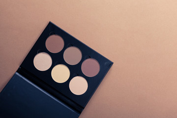 Set of decorative cosmetics on light color background