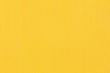 Yellow fishnet cloth material texture background. Nylon texture. Nylon fabric. Nylon bag for...