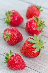 Fresh strawberries on wooden table