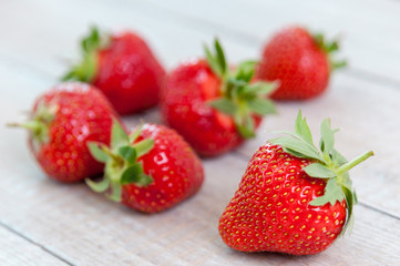 Fresh strawberries on wooden table