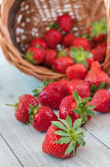 Fresh strawberries on old wooden background