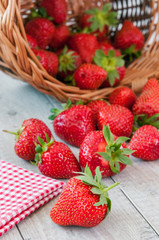 Fresh strawberries on old wooden background