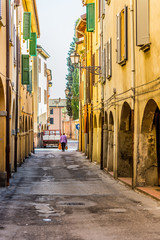 old woman with two large shopping bags