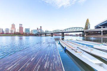 pier with boats,cityscape and skyline of portland