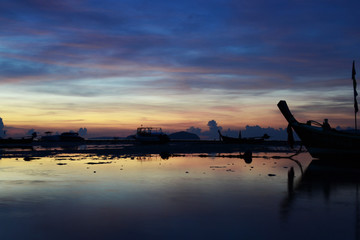 Fototapeta na wymiar sunrise on beach at fishherman village Rawai beach Thailand 