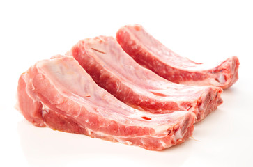 raw pork ribs on white