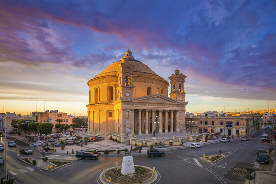 Malta - The famous Mosta Dome at sunset with beautiful sky and clouds