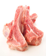 raw pork ribs on white