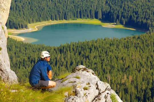Watching Tourist with Lake of Crno Jezero on Background, Durmitor
