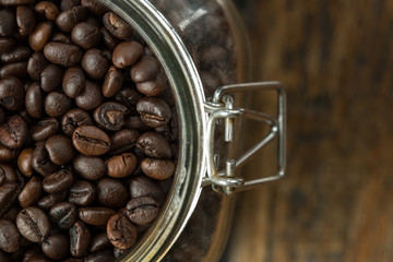 Coffee beans on wood background