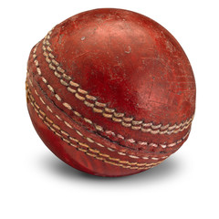 Old worn Cricket Ball isolated on white background with shadow