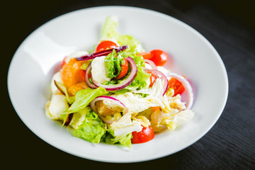 delicious vegetarian salad, salad with fruits and vegetables