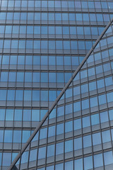 Skyscrapers with glass facade. Modern buildings in Paris business district. Concepts of economics, financial, future.  Copy space for text. Dynamic composition.