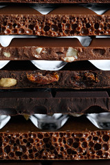 Set of different varieties of chocolate with nuts, raisins and f