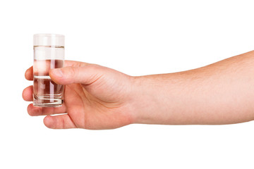 Man's hand keeps  glass vodka isolated on white background.