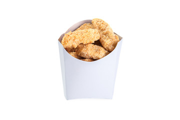 baked chicken nuggets in a white box isolated on white