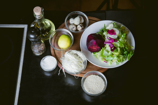 ingredients for a salad of quail eggs, a dish
