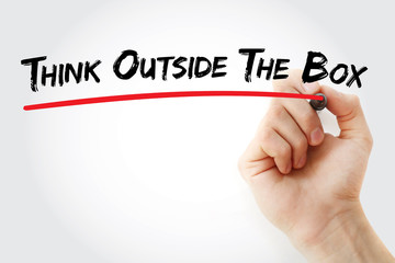 Hand writing Think Outside The Box with red marker, business concept
