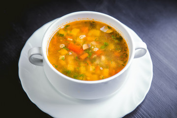vegetable soup on the plate, delicious dish, food