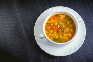 vegetable soup on the plate, delicious dish, food