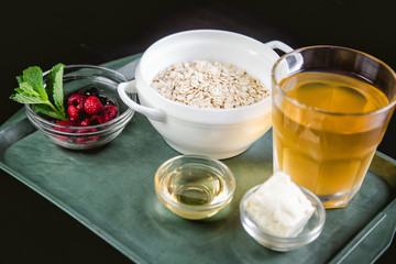 ingredients for oatmeal with berries and honey