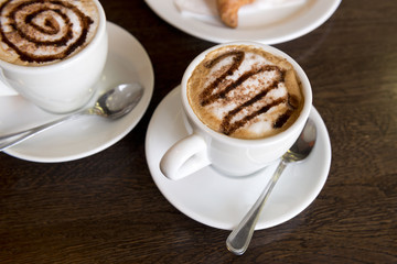 Two cappuccino cups