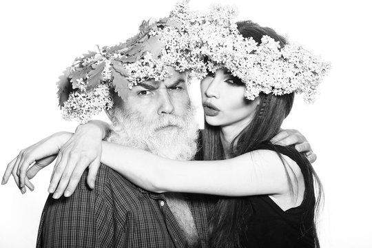 Man and woman in wreathes