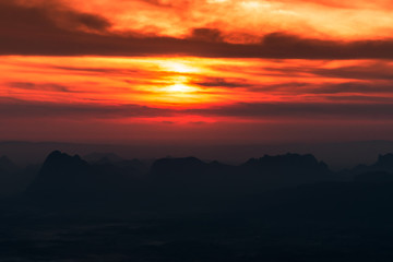 Bright and colorful high mountain landscape at sunrise.