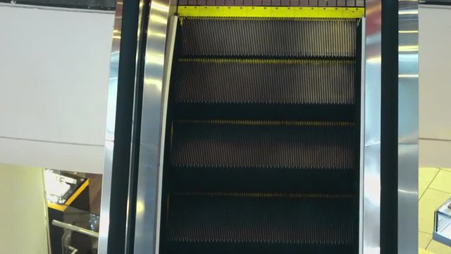  moving escalator in Modern Urban Interior. Full Hd Stock Footage Clip.
