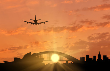 Silhouette of Sydney and the plane coming in to land