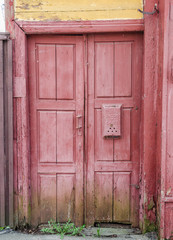 Antique door / old door / A weathered blue door / old wooden door / The Old Door with Cracked Paint Background / Door of an old abandoned building
