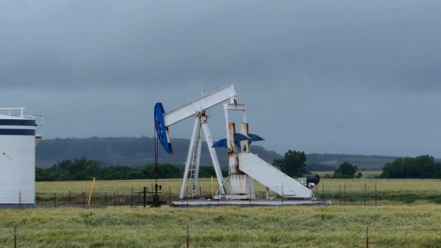 A pump jack pumping crude oil out of the ground