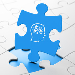 Education concept: Head With Finance Symbol on puzzle background