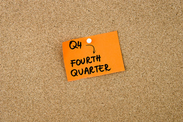 Q4 as FOURTH QUARTER written on orange paper note