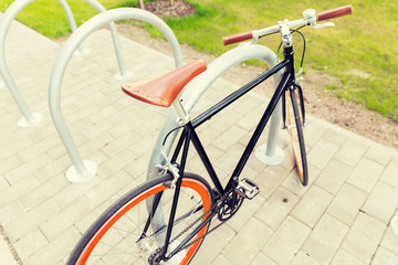 close up of fixed gear bicycle at street parking