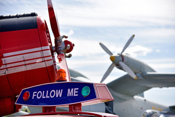 Aircraft propellers of planes in the airport and the car with th