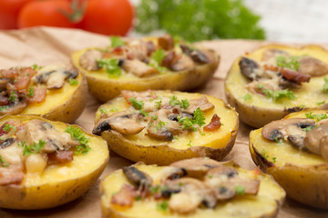 baked potato with mushrooms and bacon with cheese.