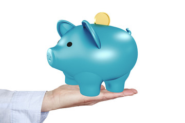 Hand holding piggy bank